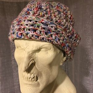 Hand-made knitted multicolored beanie.